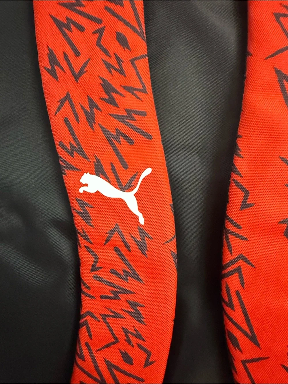 Puma Black Backpack with Red Graphic Front Panel Christian Pulisic